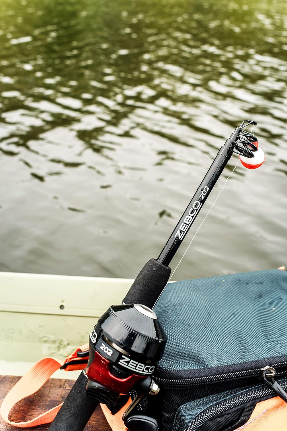 Spincast Reel and Telescopic Fishing Rod Combo, 17-Inch to 5-Foot 6-Inch Telescopic Fishing Pole, Size 30 Reel, Right-Hand Retrieve, Pre-Spooled with 10-Pound Line, Black/Red O87515
