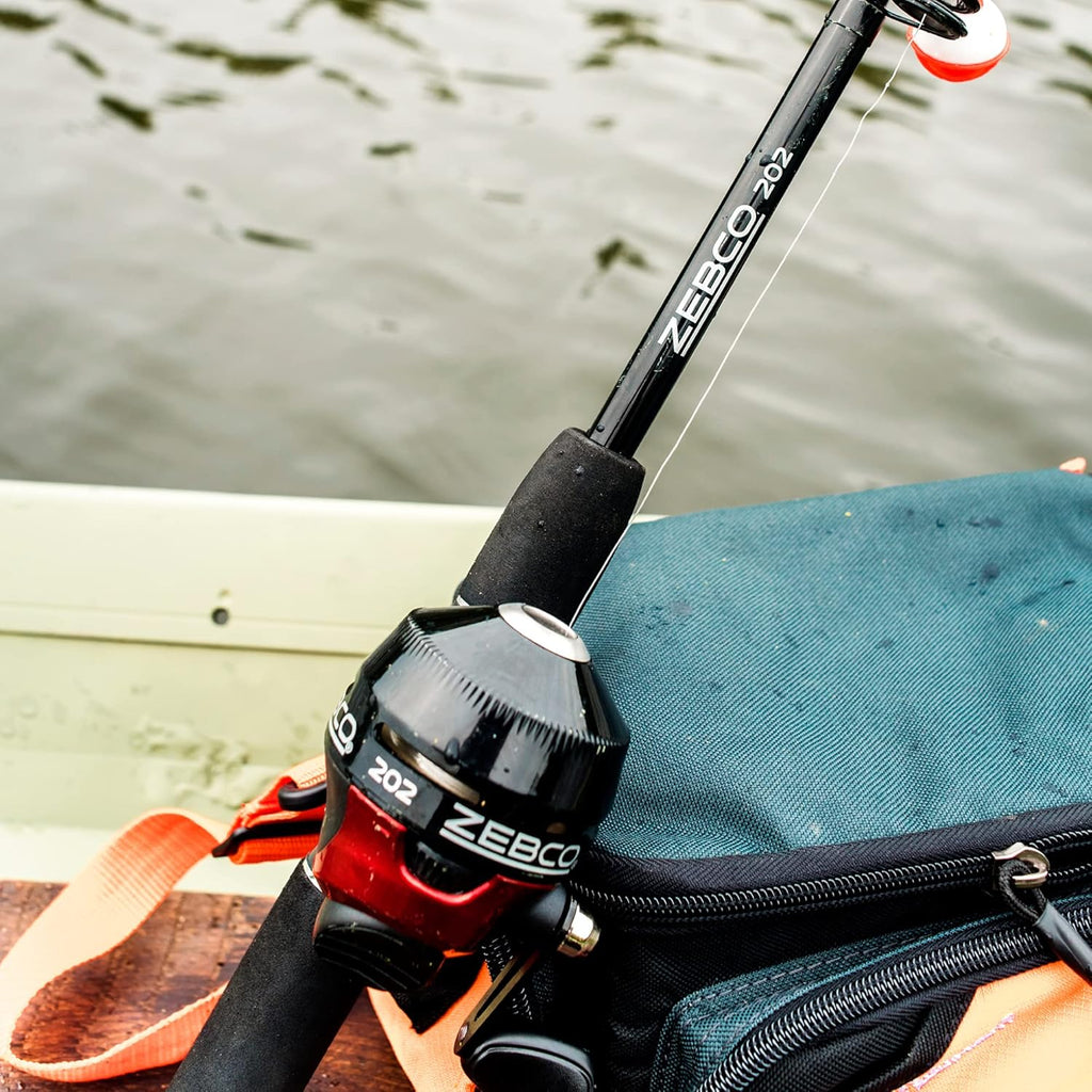 Spincast Reel and Telescopic Fishing Rod Combo, 17-Inch to 5-Foot 6-Inch Telescopic Fishing Pole, Size 30 Reel, Right-Hand Retrieve, Pre-Spooled with 10-Pound Line, Black/Red O87515
